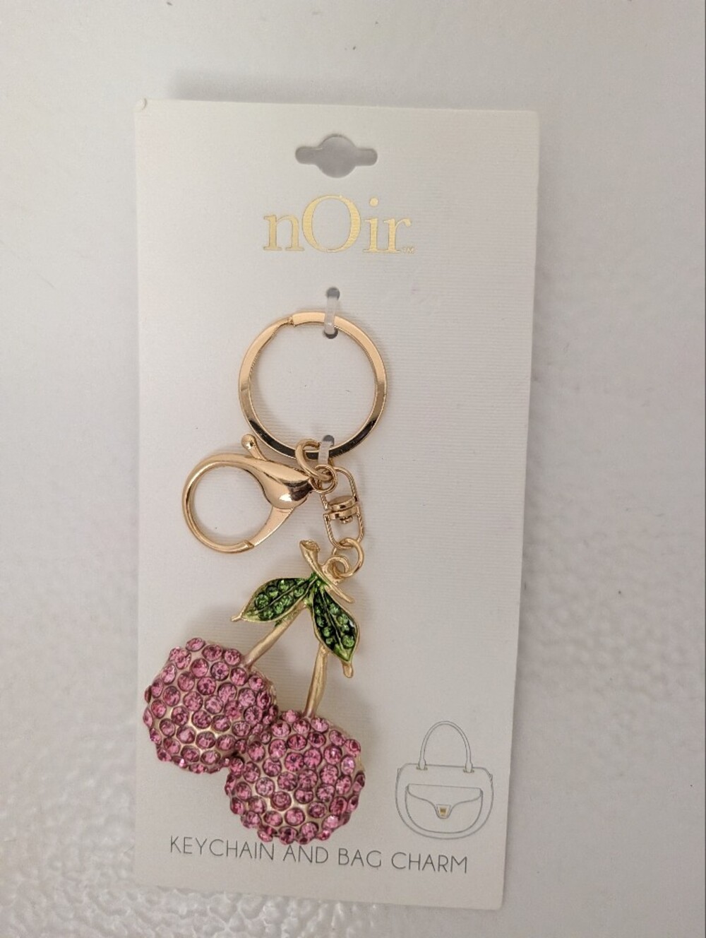 nOir Jewelry Pink Crystal Cherry Keychain with Gold Hardware and Green Leaves